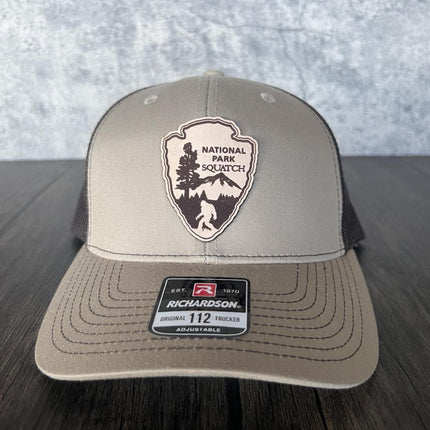 Close-up of leather patch featuring Bigfoot and national forest design