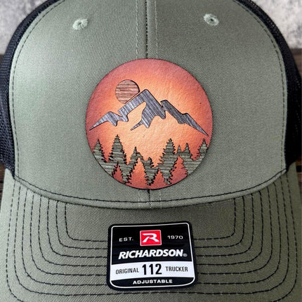 WoodHide© Mountain Scene Hat – Richardson 112 Trucker Cap with Sunburst Leather & Wood Layers - Patch Palooza