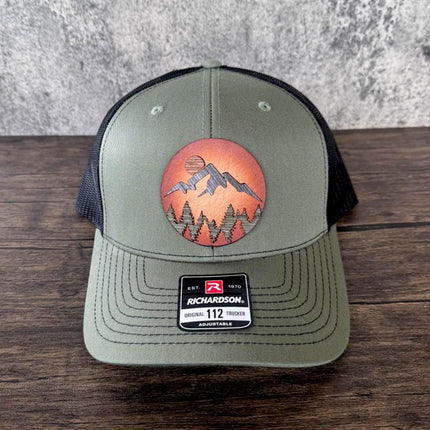 WoodHide© Mountain Scene Hat – Richardson 112 Trucker Cap with Sunburst Leather & Wood Layers - Patch Palooza