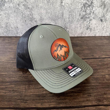 WoodHide© Mountain Scene Hat – Richardson 112 Trucker Cap with Sunburst Leather & Wood Layers - Patch Palooza