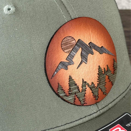 WoodHide© Mountain Scene Hat – Richardson 112 Trucker Cap with Sunburst Leather & Wood Layers - Patch Palooza