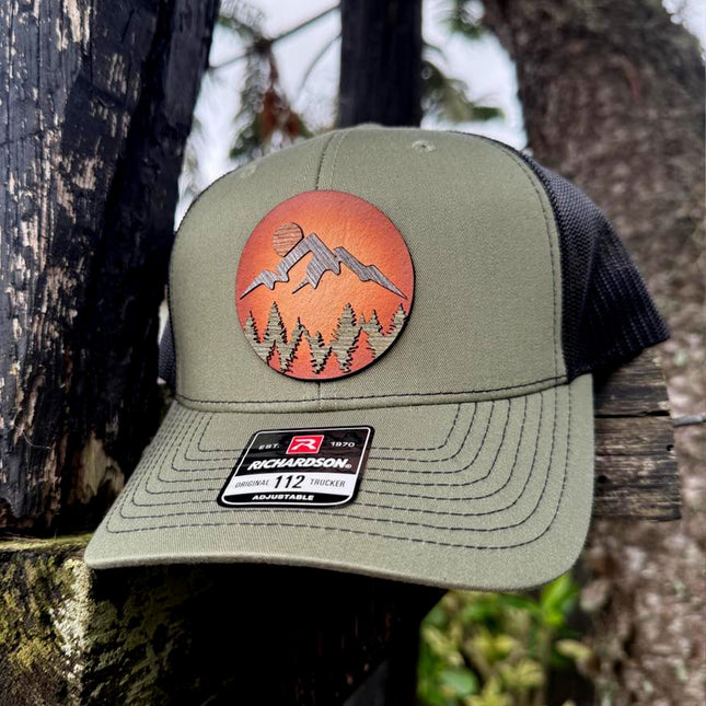 WoodHide© Mountain Scene Hat – Richardson 112 Trucker Cap with Sunburst Leather & Wood Layers - Patch Palooza