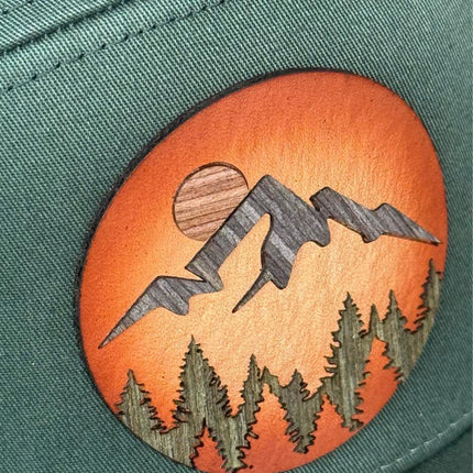 WoodHide© Mountain Scene Hat – Richardson 168 Trucker Cap with Sunburst Leather & Wood Layers - Patch Palooza